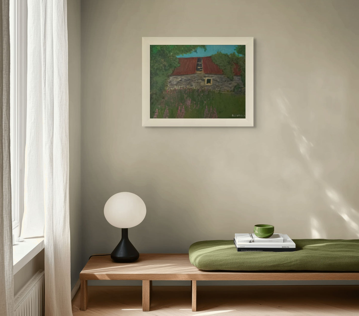 Modern interior with a framed painting, lamp, and small table.